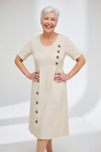 Linéora™ — Robe rayée fluide au charme estival