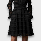 Noémie™ — Robe noire élégante à texture raffinée